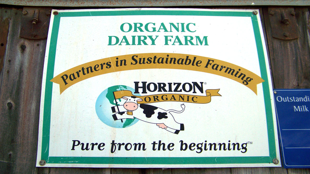 Young dairy farm sign