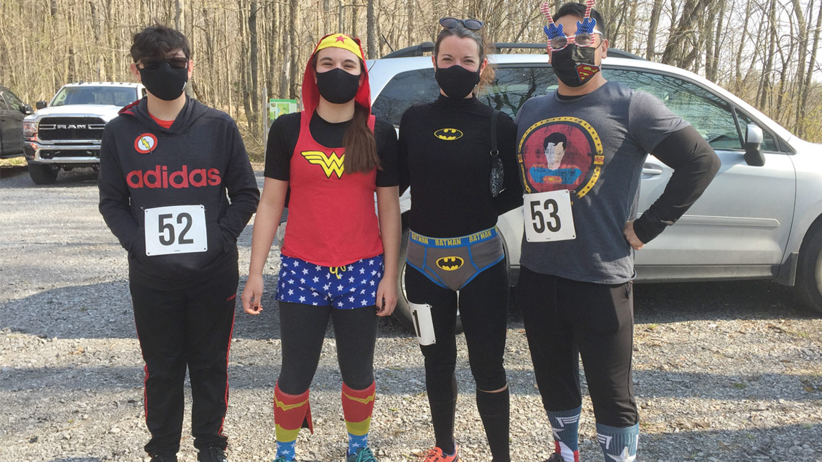 soggy sneakers runners dressed as super heroes